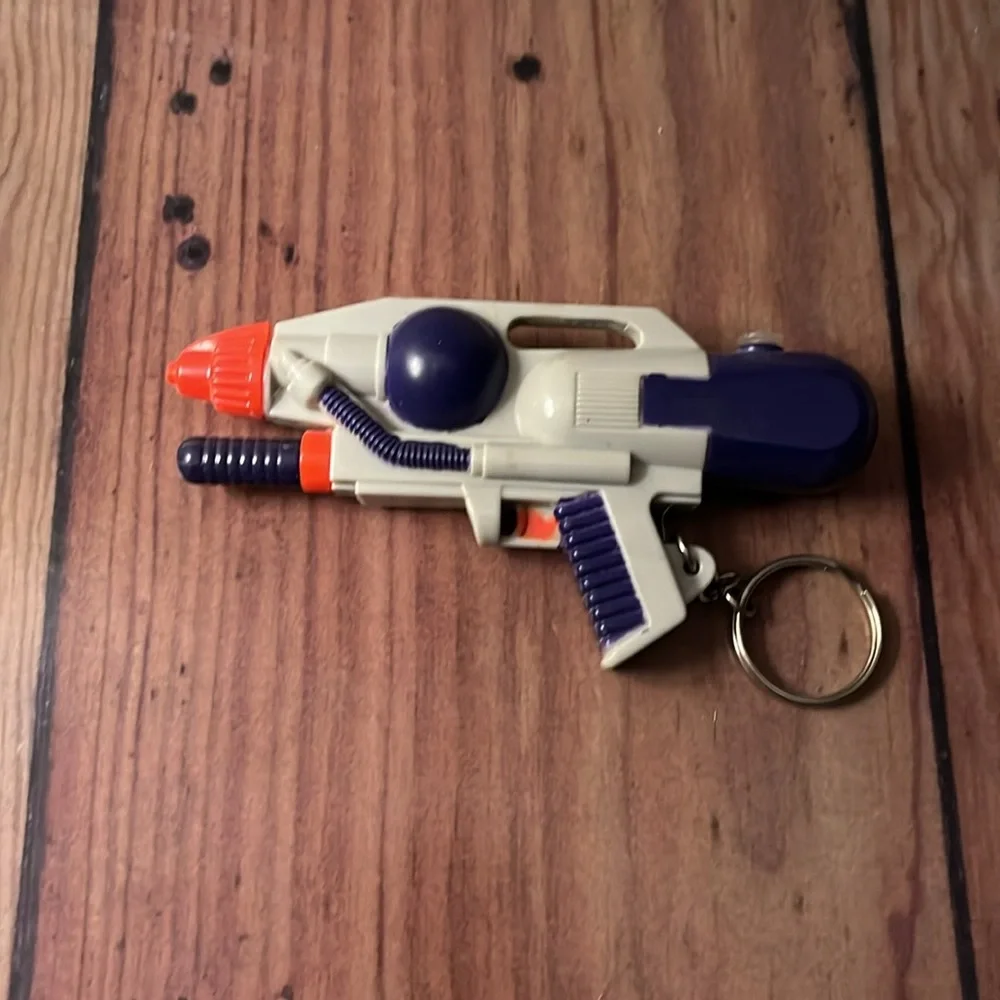 Vintage Soaker Water KeyChain 1998